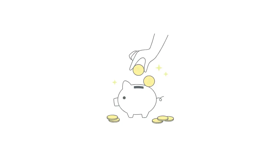 貯金箱にお金を入れる