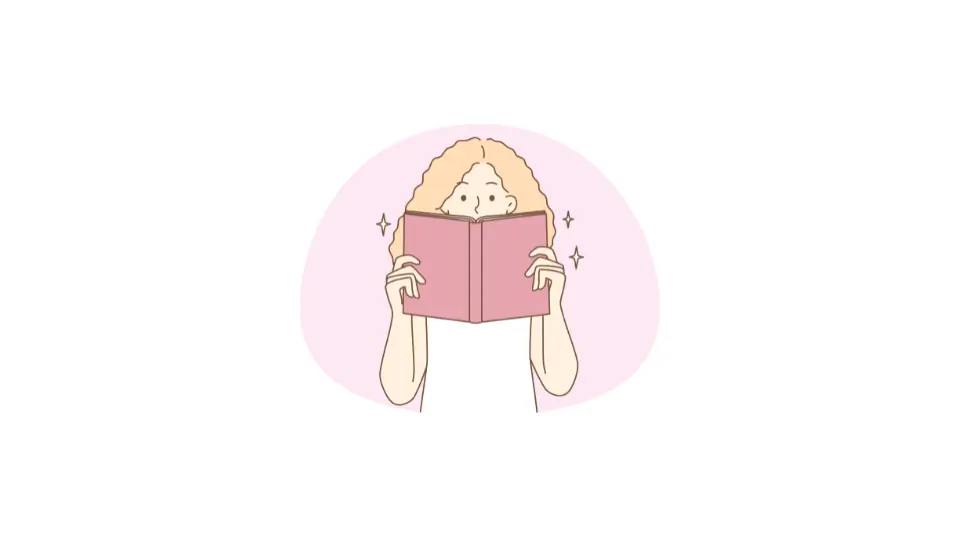 漫画を持っている女の人